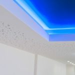 Seamless abutment custom shadow gap ceiling detail at Argent House