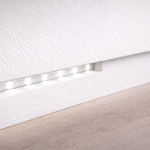 Seamless abutment shadow gap LED lighting detail on wood floor