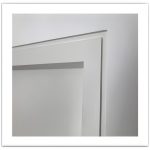 Seamless abutment shadow gap architrave profile curated detail – close-up