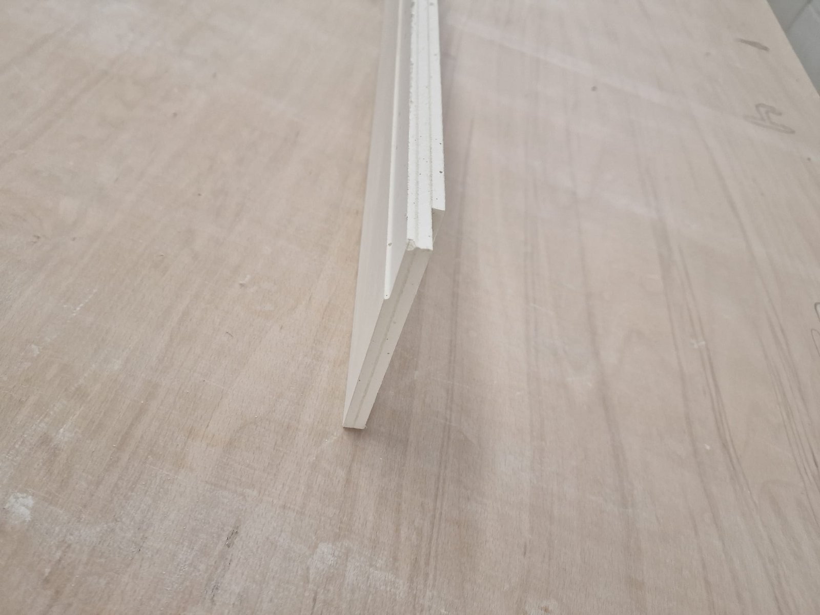 Seamless abutment shadow gap skirting detail with LED lighting strip